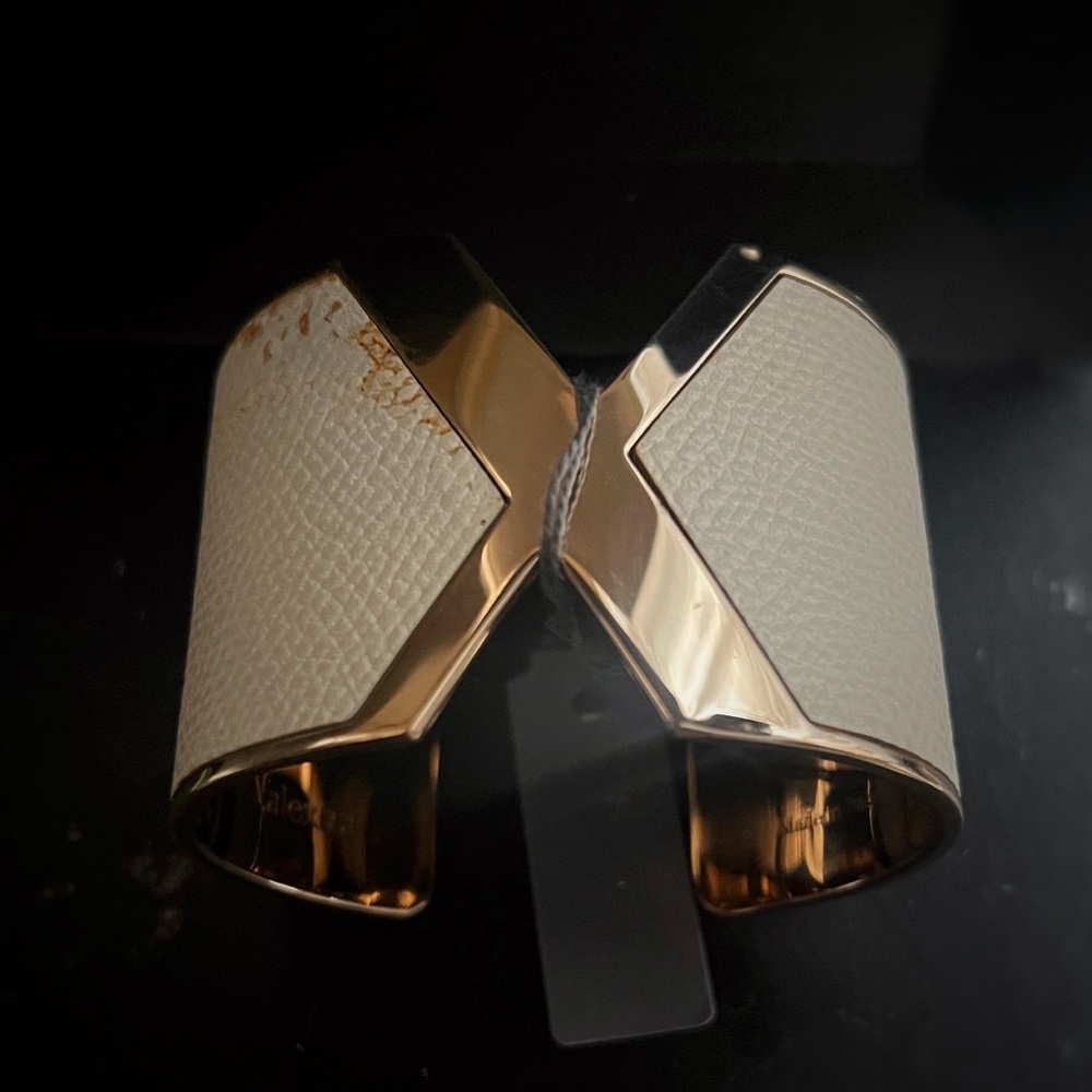 Gold-tone Valextra VX cuff with leather.